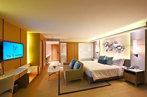 Фото M Pattaya Hotel