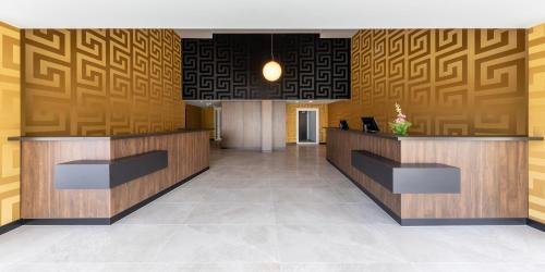 Фото Trip Inn Conference Hotel & Suites