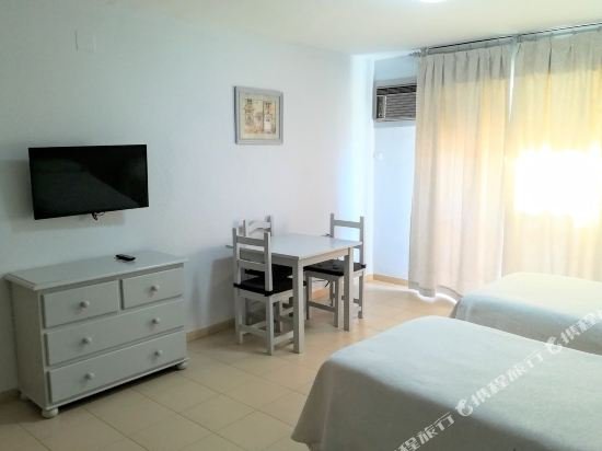 Фото Apartamentos Puerta del Sur