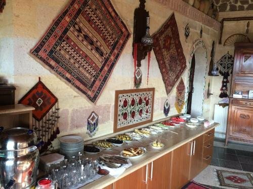 Гостиница Sinasos Palace Cave Hotel в Ешильхисаре