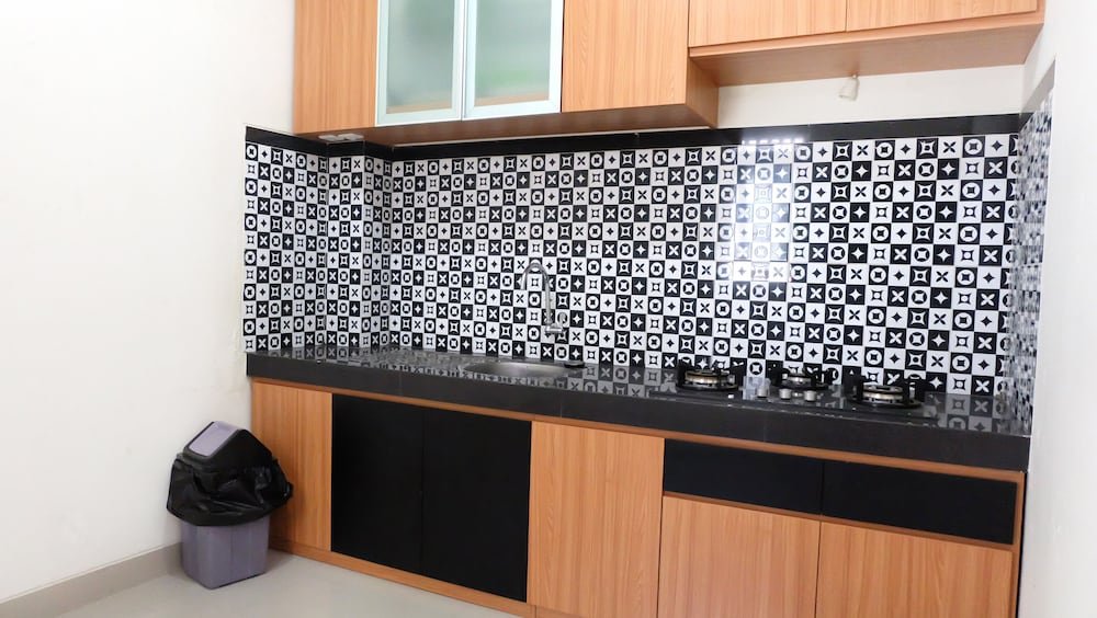 Фото Simply Homy Guest House Unit Bintaran