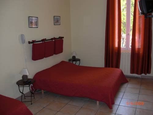 Фото Au Saint Roch - Hôtel et Jardin