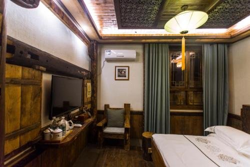 Фото Dielianhua Cowherd Inn Zhangjiajie