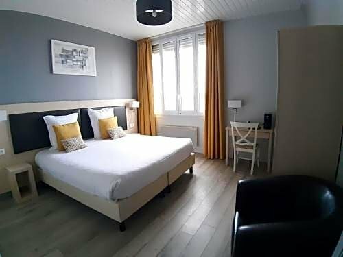 Гостиница Hôtel Les Embruns в Трувиль-сюр-Мере