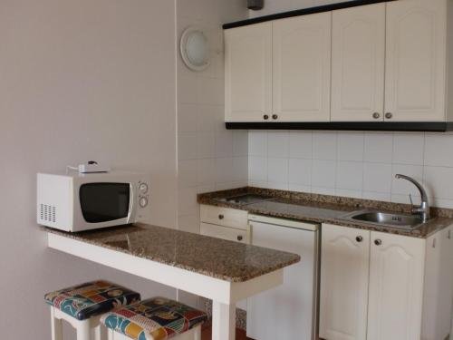 Фото Apartamentos Puerto Bello