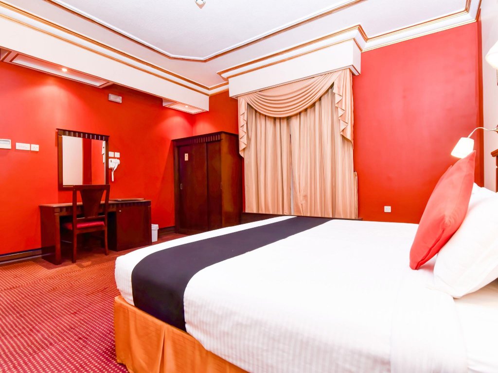 Фото Capital O456 Almansour Grand Hotel