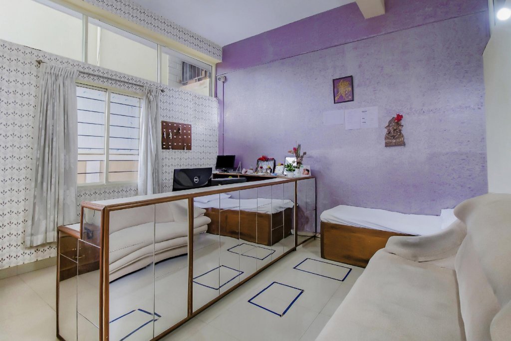 Фото Oyo 12776 SV Suites