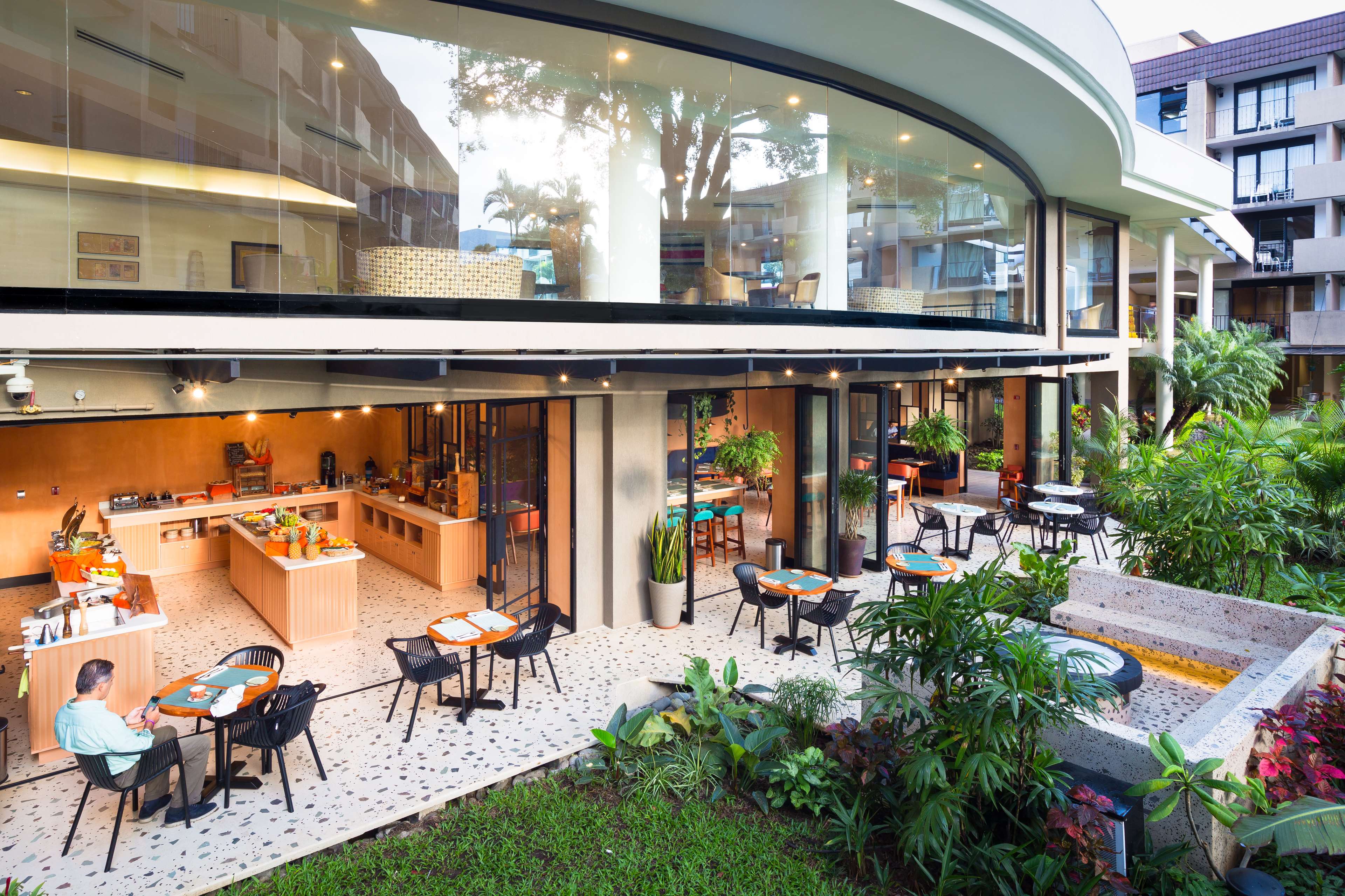 Фото Irazu Hotel & Studios