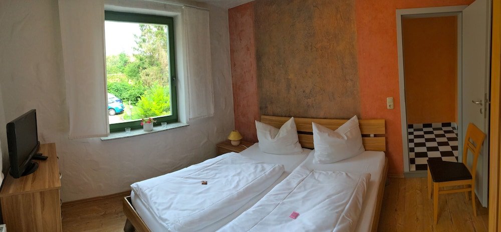 Фото Ferienwohnungen 'Am Butterturm'