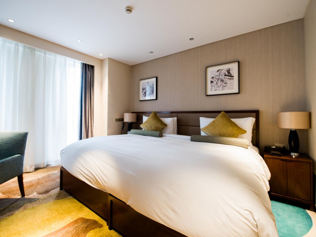 Фото Oakwood Hotel & Residence Suzhou