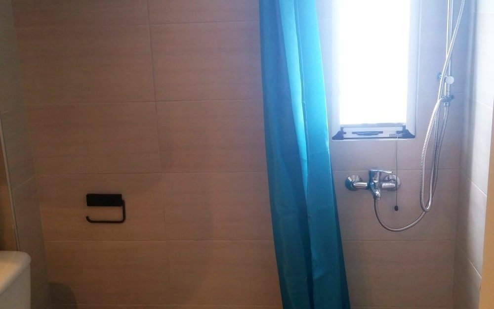 Фото Salonikiou Beach Deluxe Apartments