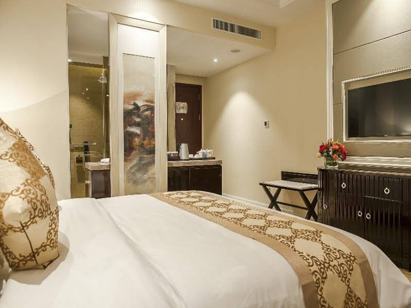 Фото Hangzhou Huachen Fengting Hotel