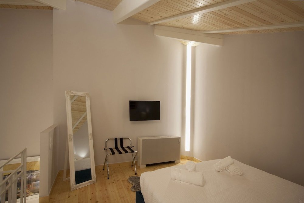 Фото Ether Loft Suites