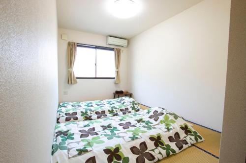 Фото Uzushio Guest House