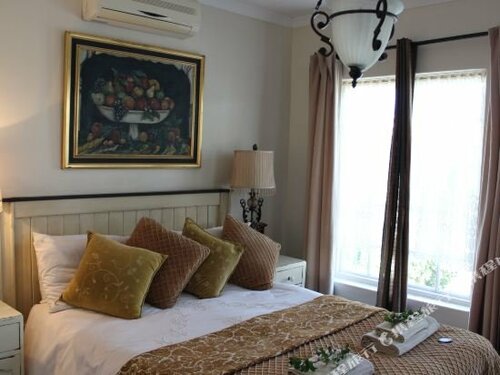 Гостиница A Tapestry Garden Guest House