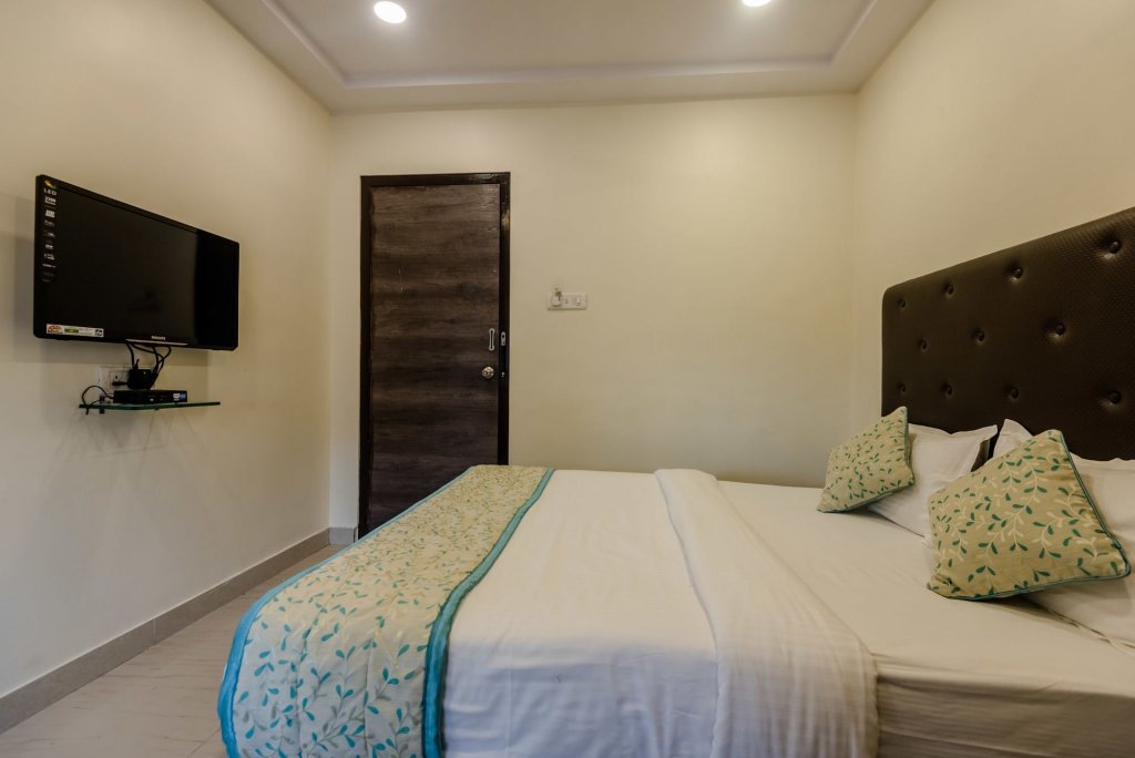 Фото Oyo 8373 Rigga Inn