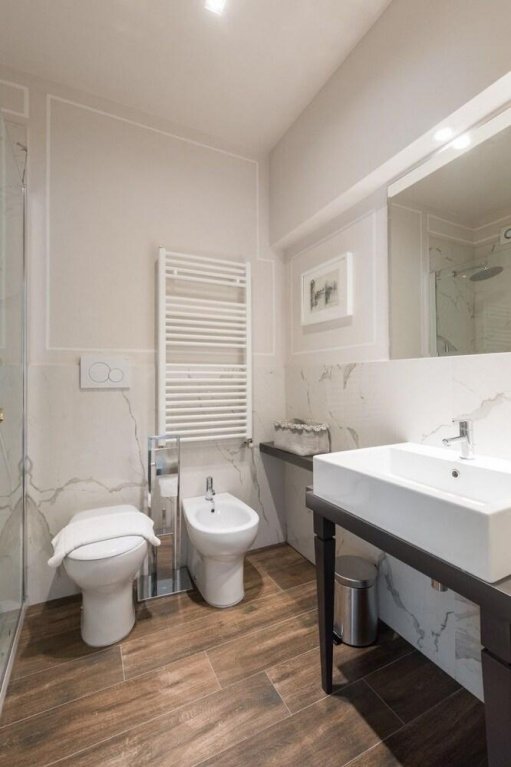 Фото Deluxe Apartment