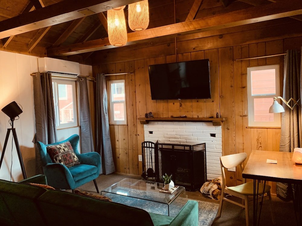 Фото Grand Pine Cabins