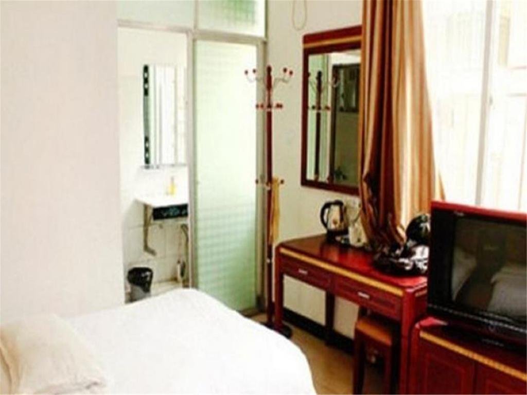 Фото Wangxin Business Hotel