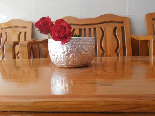 Фото Man Thi Tar Hotel