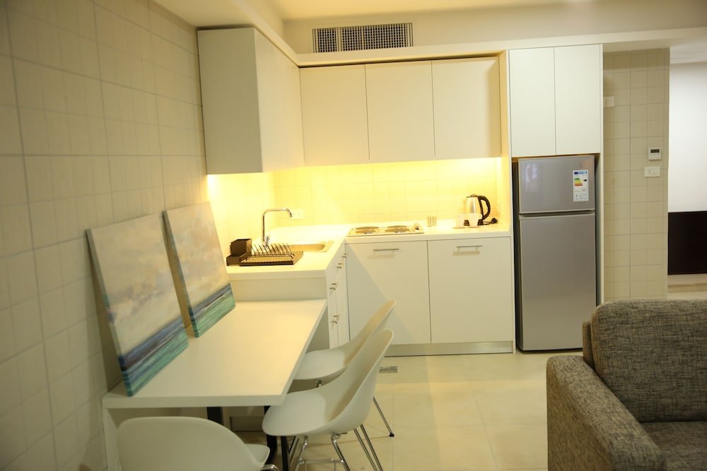 Фото Triple A Hotel Apartments