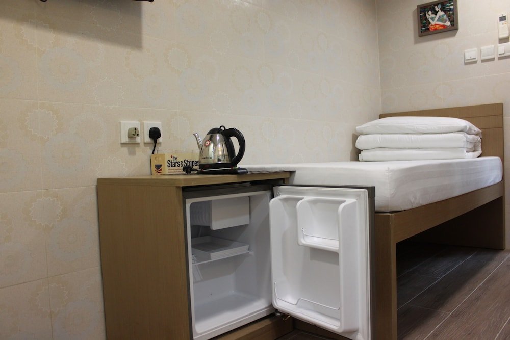 Фото Hoi Shing Hotel