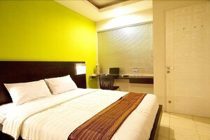 Гостиница LeGreen Suite Ratulangi