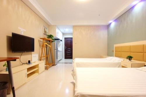 Фото Weihai You Gang Vacation ApartHotel