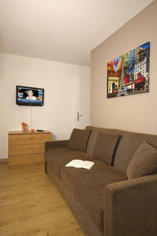 Фото Séjours & Affaires Charles de Gaulle