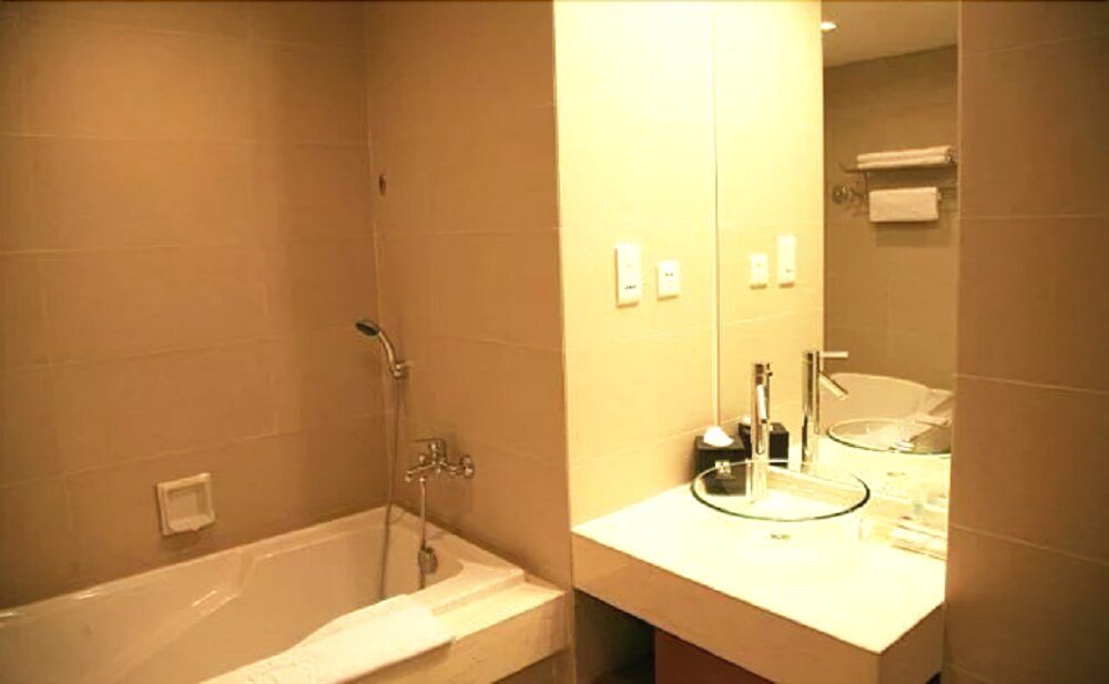 Фото Dalian Bolt Hotel