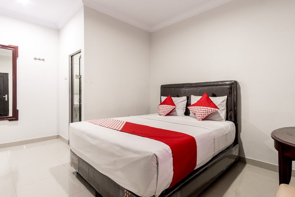 Фото Oyo 283 Helvetia Residence