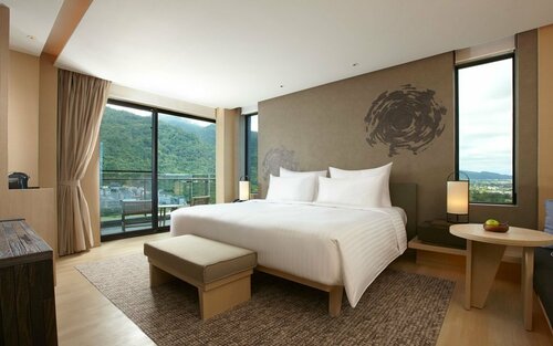 Гостиница Mu Jiao XI Hotel