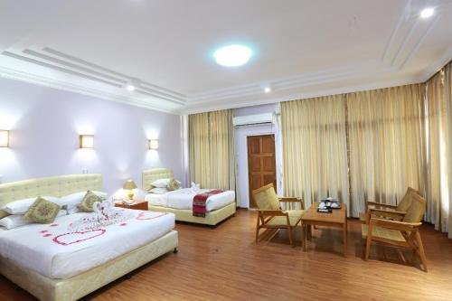 Фото The Floral Breeze Wun Zin Hotel