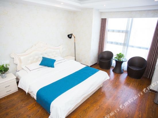 Фото Weihai You Gang Vacation ApartHotel