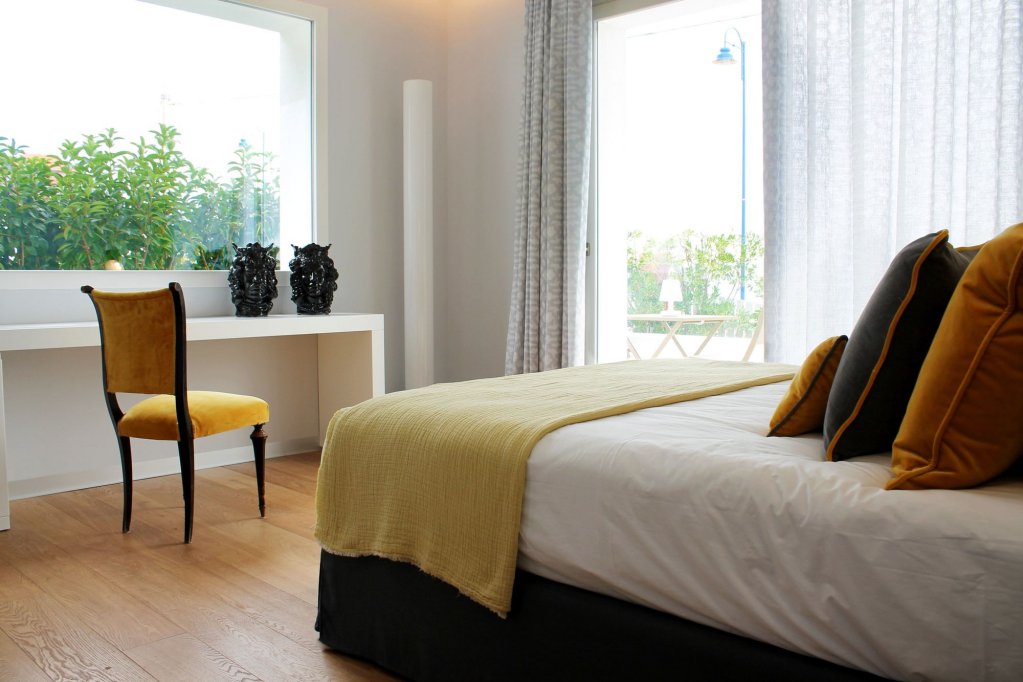 Фото Unìco Boutique Hotel d'Arte