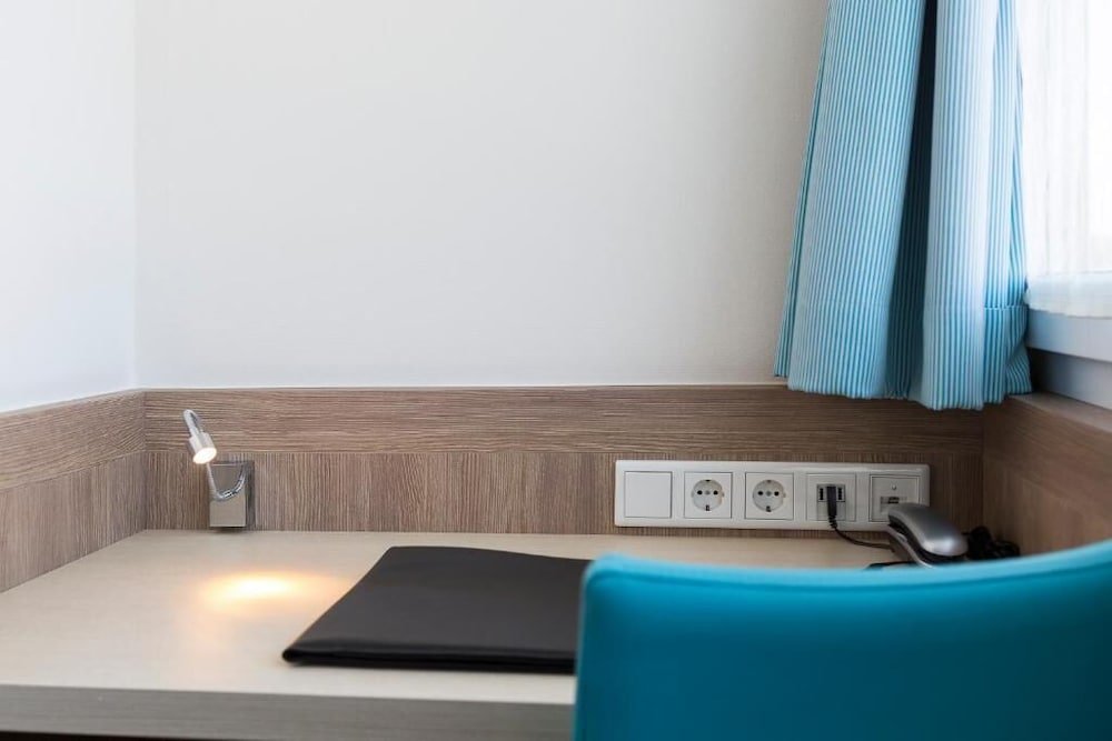 Фото Hotel Vier Jahreszeiten Lübeck