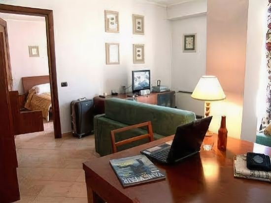 Фото Crosti Apartments