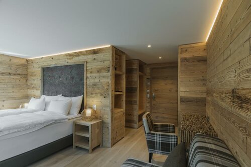 Гостиница Caschu Alp Boutique Design Hotel Stoos