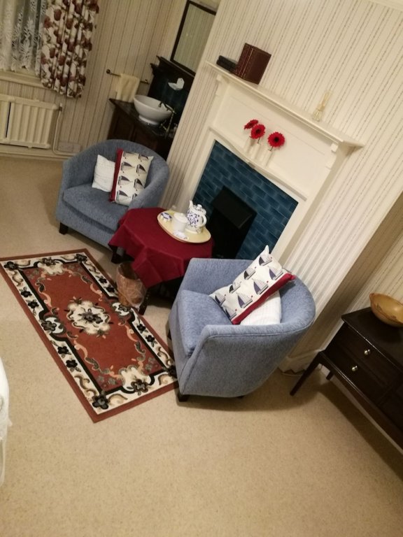 Фото Swiss Cottage Bed And Breakfast