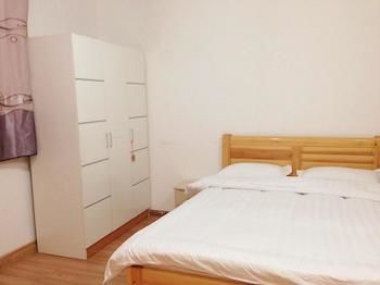 Фото Yuelai Apartment Hotel