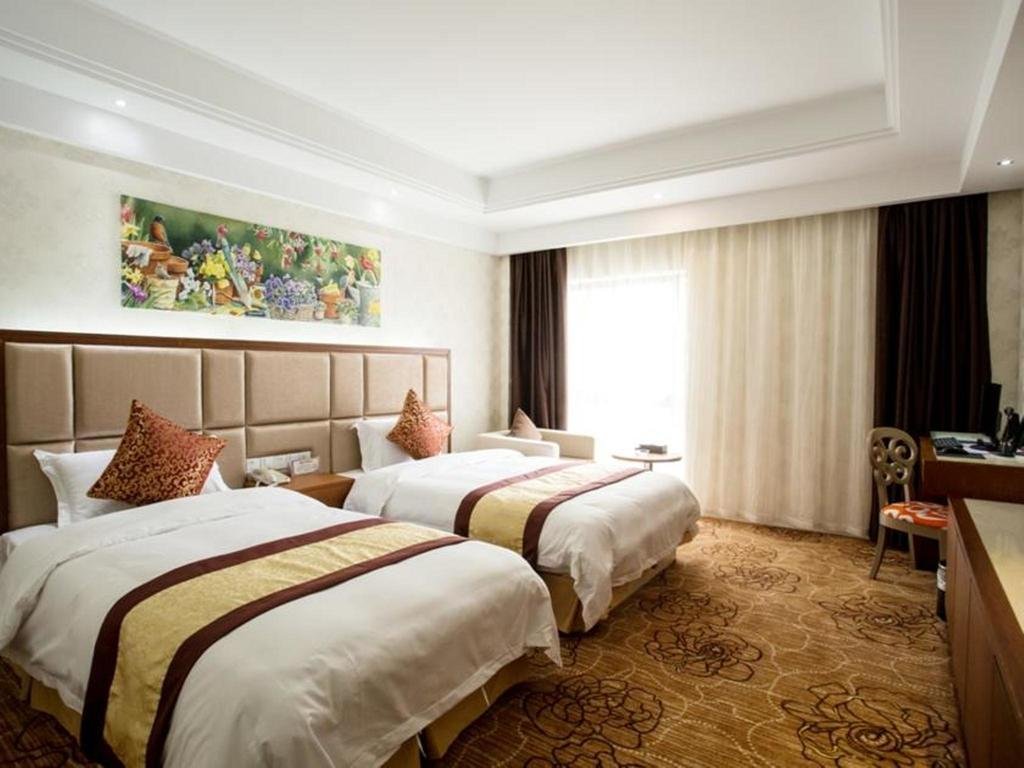 Фото Ningbo Heshen Hotel