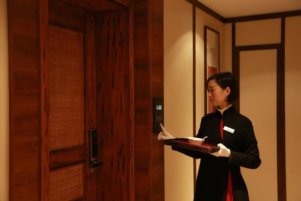 Фото Chengdu Chuanjia Heyuan Theme Hotel