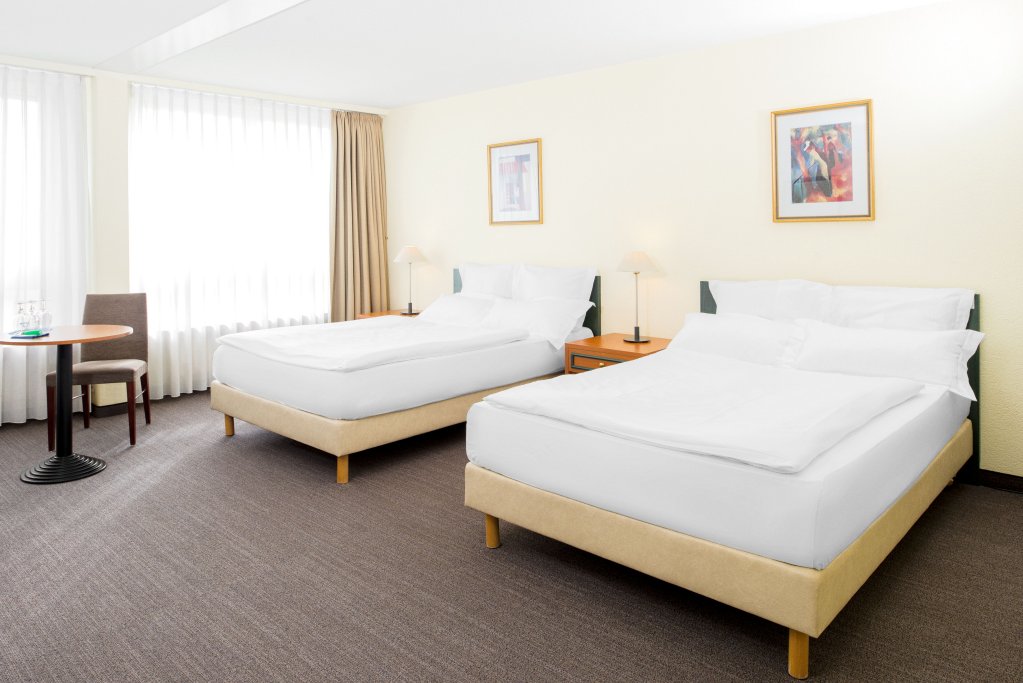 Фото Nh Fribourg Hotel