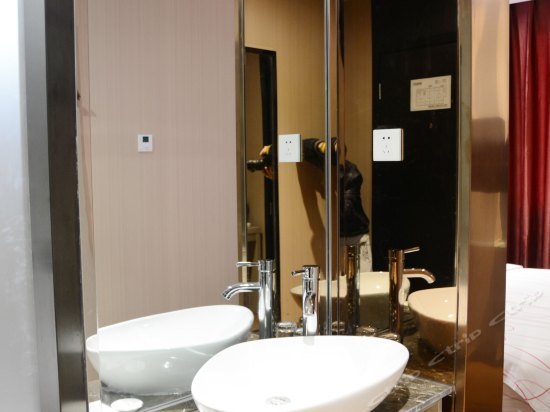 Фото Xinhua Boutique Hotel