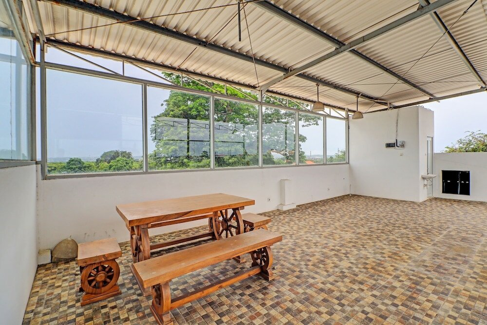 Фото Capital O 92039 Runways House