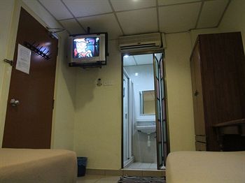 Фото Oyo 615 Dragon Inn Premium Hotel