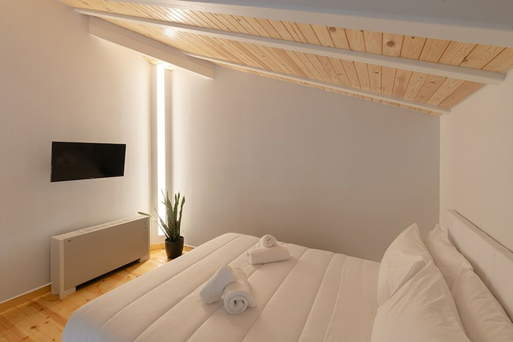 Фото Ether Loft Suites