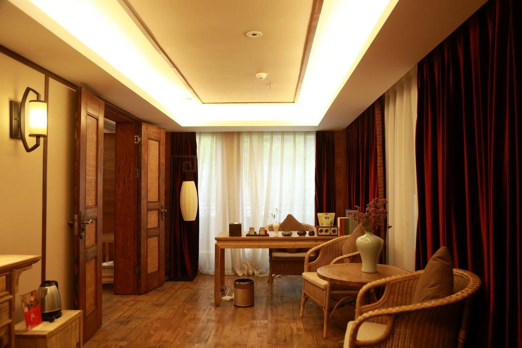 Фото Chengdu Chuanjia Heyuan Theme Hotel