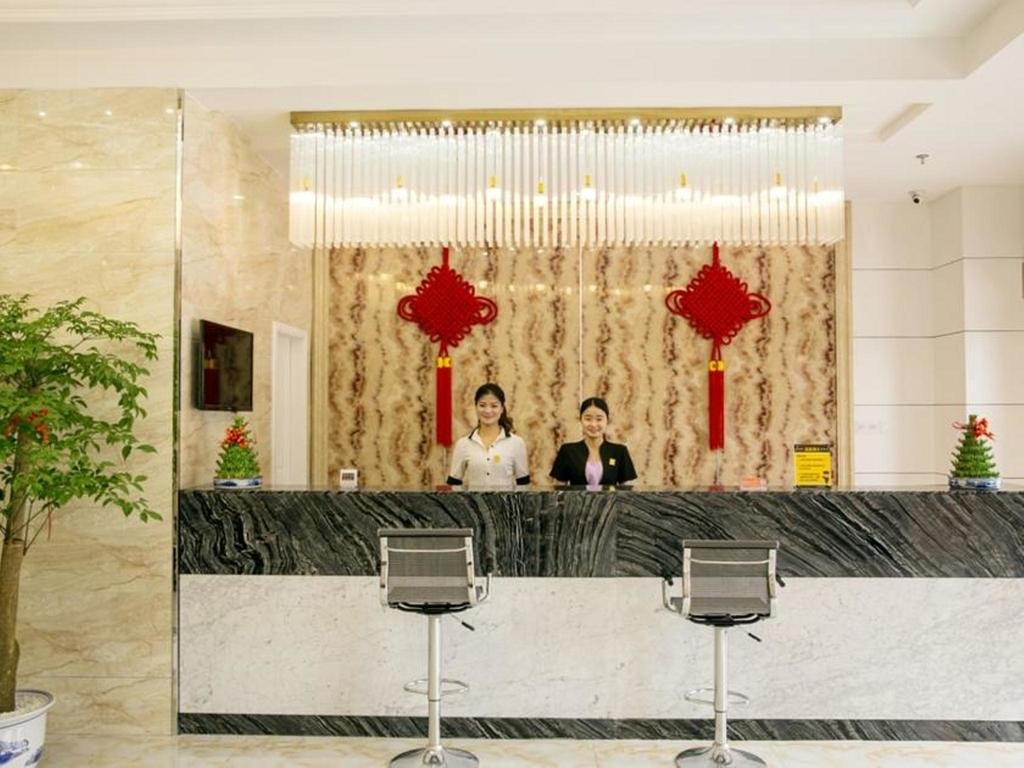 Фото Ningbo Heshen Hotel
