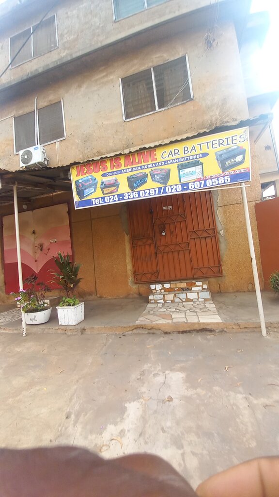Auto parts and auto goods store Jesus Is Alive Car Batteries, Accra, photo